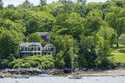 The homes of Lisa Gorman, front, and Amelia and Arthur Bond are seen, Tuesday, June 4, 2024, in Cam…